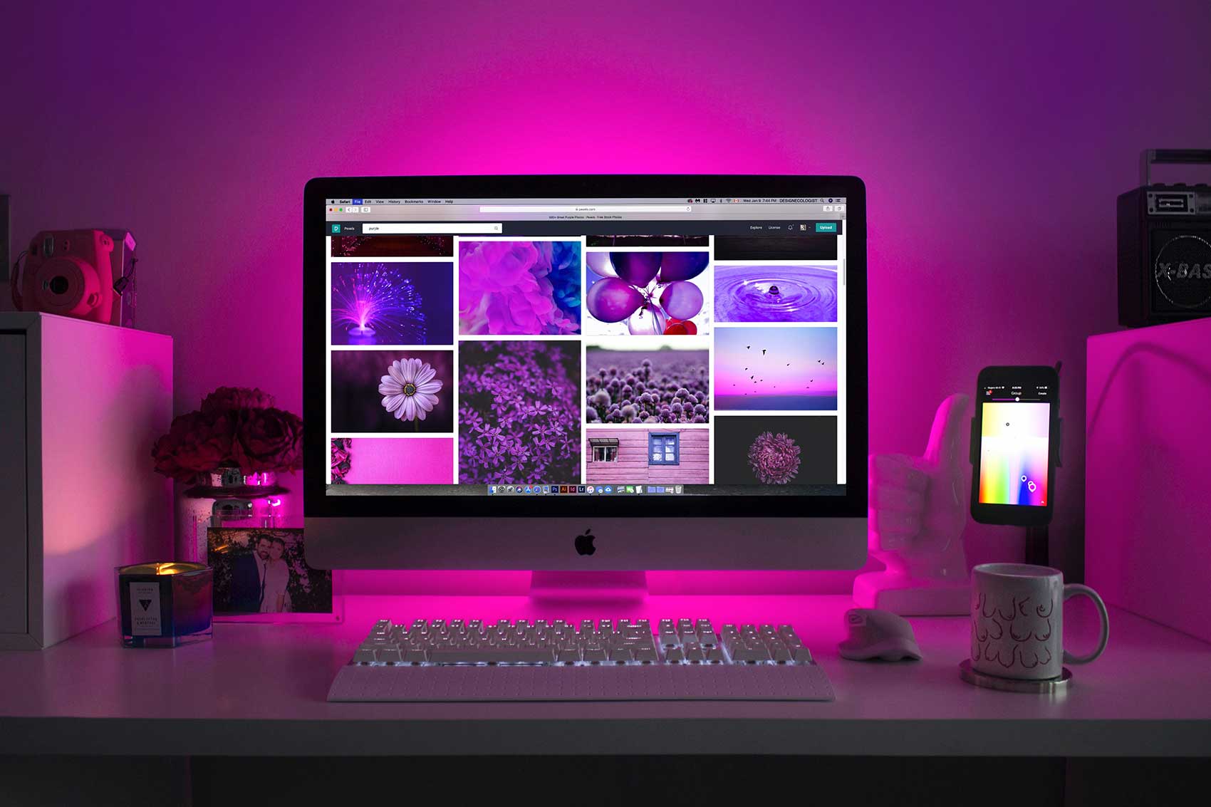 computer in front of a purple light